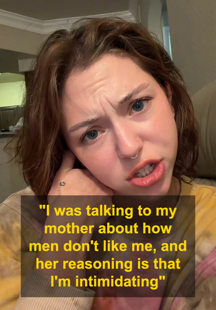 Woman with short brown hair and removed nose ring, discussing how men perceive her and political views. Woman with short brown hair and removed nose ring, discussing how men perceive her and political views.