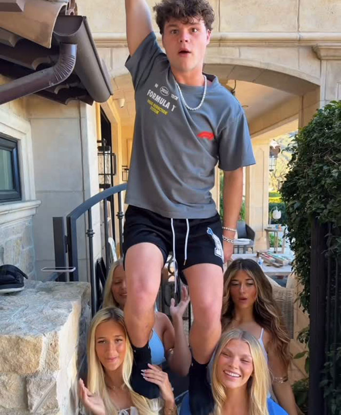 Young man lifted by a group of women outside a stone house, related to disturbing new details after adult star split. Young man lifted by a group of women outside a stone house, related to disturbing new details after adult star split.
