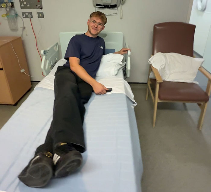 20-year-old man in hospital bed resting after deciding to amputate his leg following a rock concert experience 20-year-old man in hospital bed resting after deciding to amputate his leg following a rock concert experience