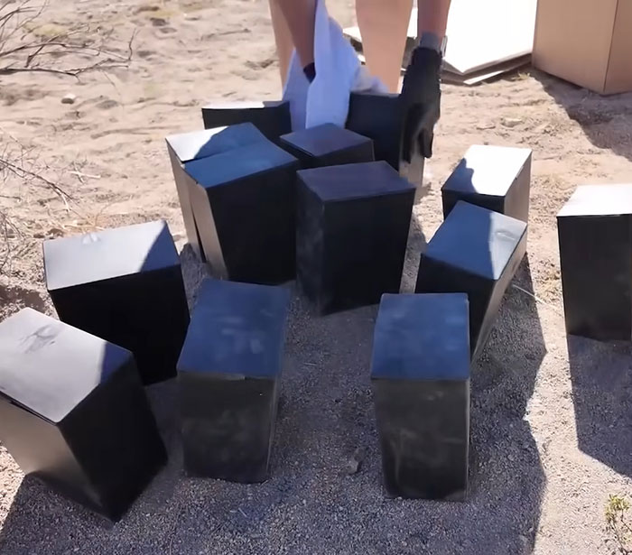 Several black urns placed on the desert ground as part of an urgent investigation of human remains in Las Vegas desert. Several black urns placed on the desert ground as part of an urgent investigation of human remains in Las Vegas desert.