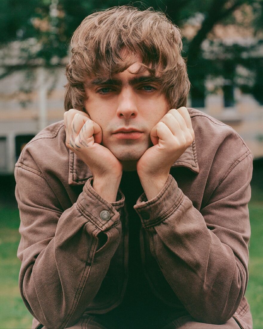 Lennon Gallagher posing outdoors with hands on face, representing nepo babies defining Hollywood’s new generation style. Lennon Gallagher posing outdoors with hands on face, representing nepo babies defining Hollywood’s new generation style.