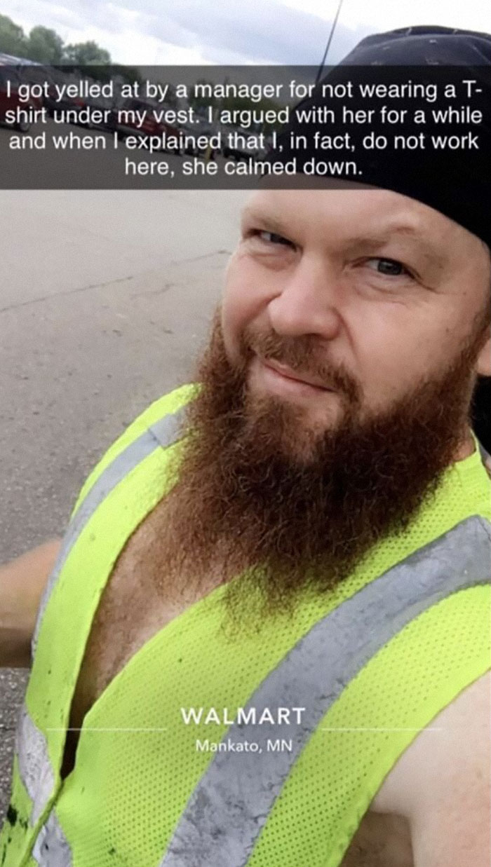 Man with a beard in a high-visibility vest at Walmart, featured in wild People of Walmart pics from Mankato Minnesota.