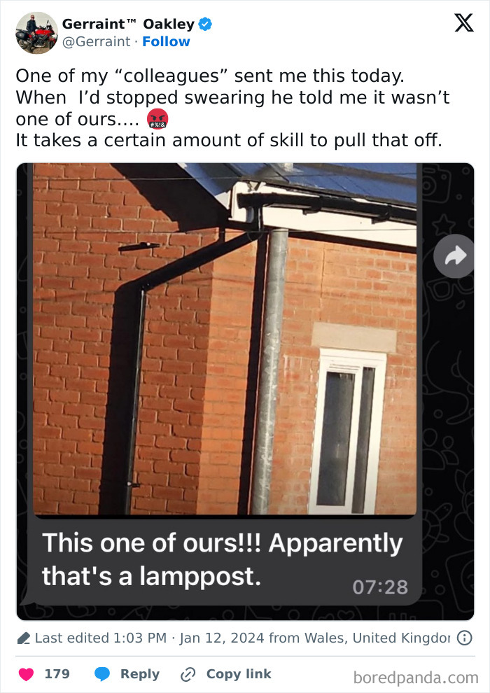 Misplaced lamppost closely installed next to a brick building, illustrating a design and architecture nightmare.