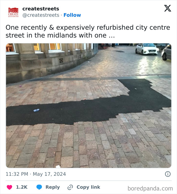 Uneven pavement repair on a city street showcasing a design and architecture nightmare with poor common sense e*******n.