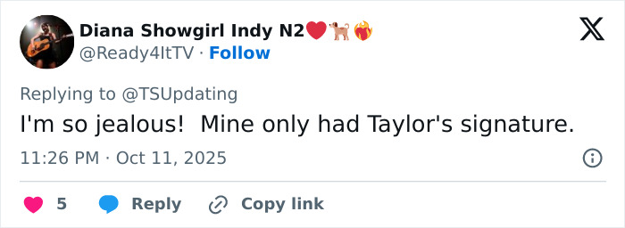 Tweet expressing jealousy over Taylor Swift fans reacting to Travis Kelce autographed albums, sparking tradwife controversy. Tweet expressing jealousy over Taylor Swift fans reacting to Travis Kelce autographed albums, sparking tradwife controversy.