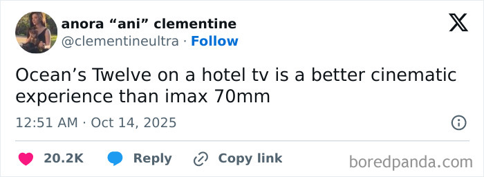 Tweet from user anora clementine humorously comparing Ocean’s Twelve on hotel TV to IMAX 70mm, highlighting Netflix comment section humor.