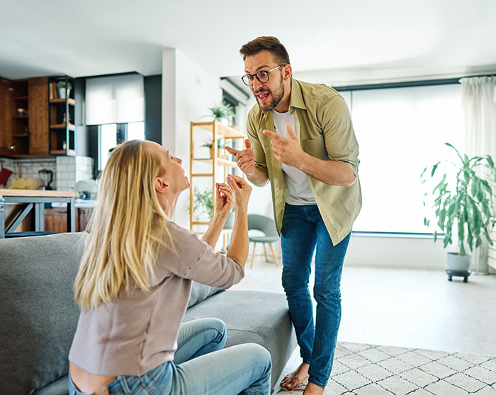 Teen arguing with dad in living room, expressing frustration after cake fail and feeling uncared for. Teen arguing with dad in living room, expressing frustration after cake fail and feeling uncared for.