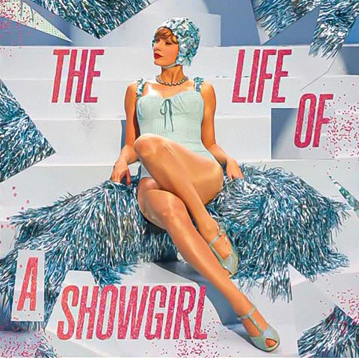 Taylor Swift in vintage swimwear posing with metallic pom-poms highlighting tradwife and fan reactions. Taylor Swift in vintage swimwear posing with metallic pom-poms highlighting tradwife and fan reactions.