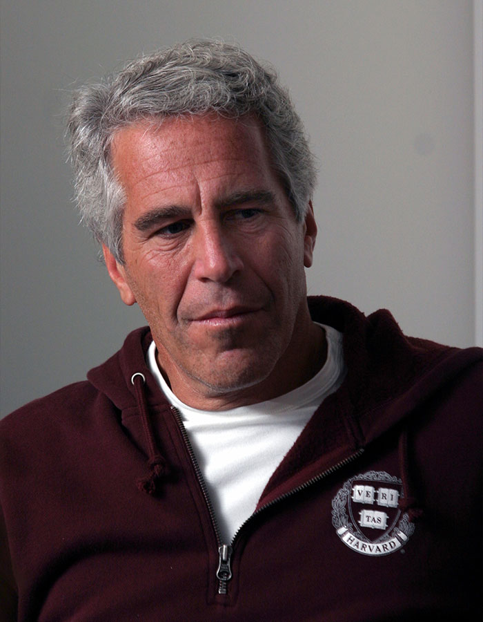 Man with gray hair, wearing a maroon Harvard hoodie, reflecting on new Prince Andrew allegations in Virginia Giuffre's memoir. Man with gray hair, wearing a maroon Harvard hoodie, reflecting on new Prince Andrew allegations in Virginia Giuffre's memoir.