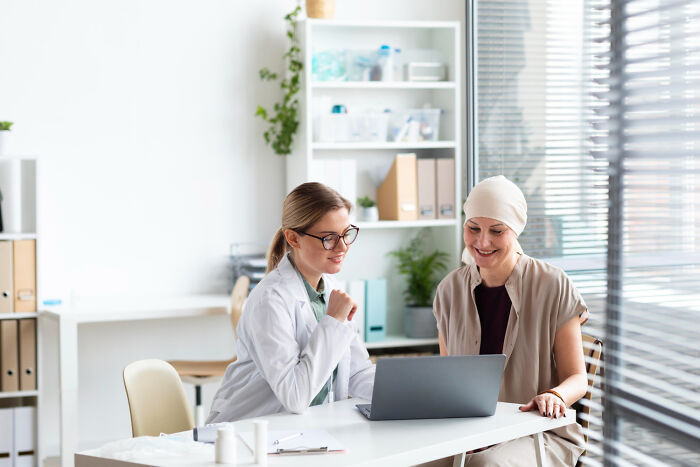 Doctor consulting a patient about terrifying medical conditions that can end someone without showing any symptoms in a clinical setting.