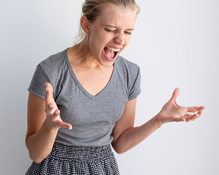 Woman expressing anger and frustration over family drama involving a bizarre fake adoption plan. Woman expressing anger and frustration over family drama involving a bizarre fake adoption plan.