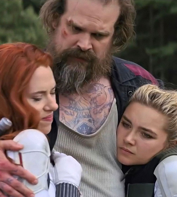 David Harbour looking serious while interacting with two women half his age in a viral controversial moment. David Harbour looking serious while interacting with two women half his age in a viral controversial moment.