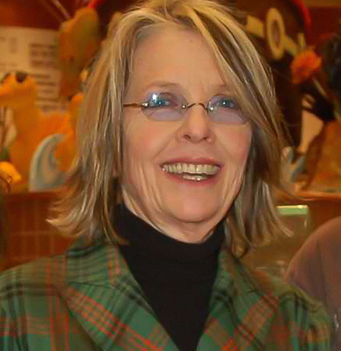 Woman with glasses and gray hair smiling indoors, illustrating Diane Keaton's last moments revealed in 911 call news story. Woman with glasses and gray hair smiling indoors, illustrating Diane Keaton's last moments revealed in 911 call news story.