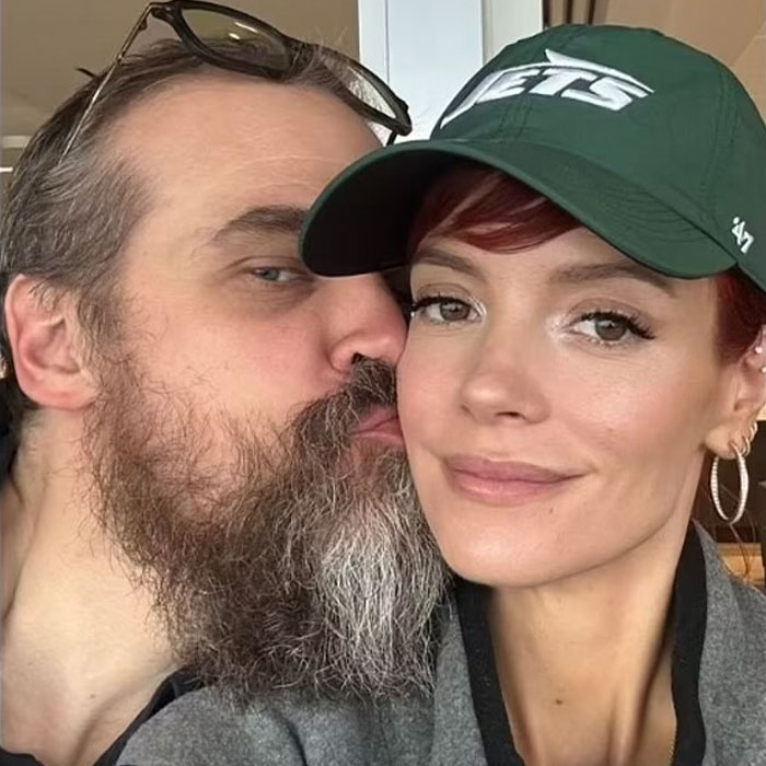Couple sharing an intimate moment with a bearded man kissing a woman in a green hat, linked to Lily Allen album and cheating claims. Couple sharing an intimate moment with a bearded man kissing a woman in a green hat, linked to Lily Allen album and cheating claims.
