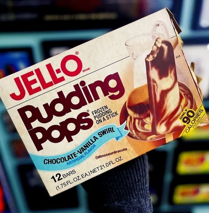 Box of Jell-O pudding pops chocolate vanilla swirl held by a hand, related to longest grudges people have revealed.