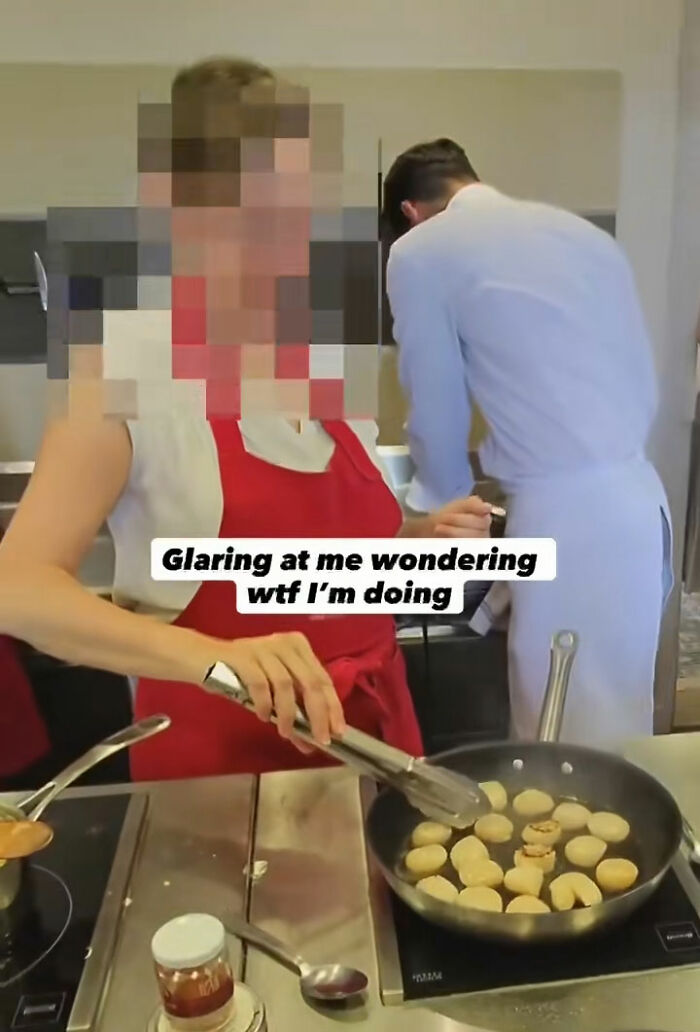 Woman cooking in a kitchen, wearing an apron, recorded with Meta glasses showing vacation regrets and an uncomfortable mistake. Woman cooking in a kitchen, wearing an apron, recorded with Meta glasses showing vacation regrets and an uncomfortable mistake.