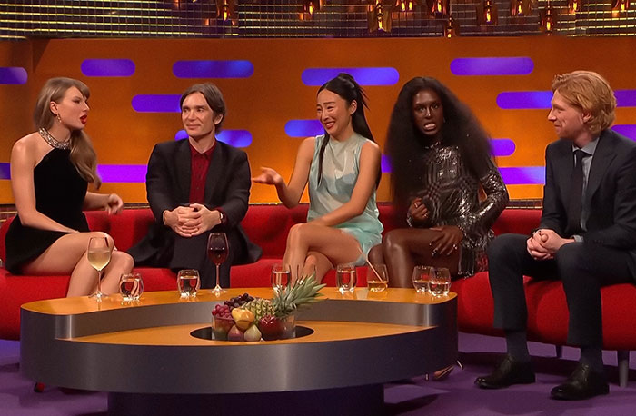 Taylor Swift with Graham Norton and guests on a talk show set discussing a controversial moment with Jodie Turner-Smith. Taylor Swift with Graham Norton and guests on a talk show set discussing a controversial moment with Jodie Turner-Smith.