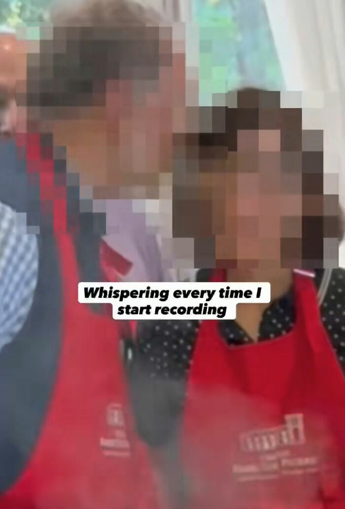 Couple wearing red aprons, capturing vacation regrets with Meta glasses, reflecting on uncomfortable recording moments. Couple wearing red aprons, capturing vacation regrets with Meta glasses, reflecting on uncomfortable recording moments.