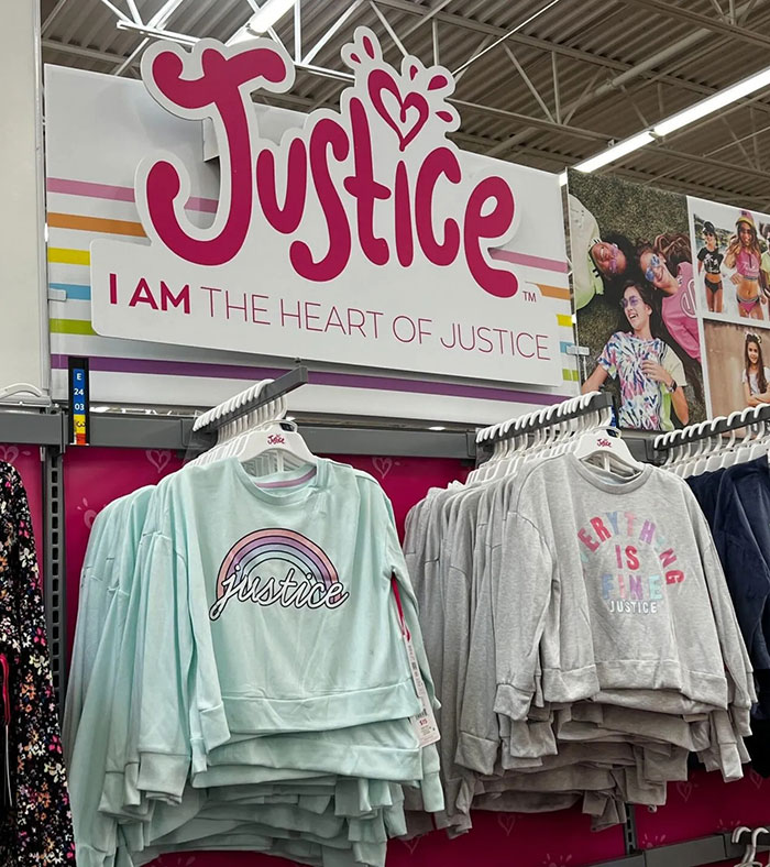 Justice brand clothing display featuring colorful hoodies and sweatshirts supporting kids’ clothes bullying awareness. Justice brand clothing display featuring colorful hoodies and sweatshirts supporting kids’ clothes bullying awareness.