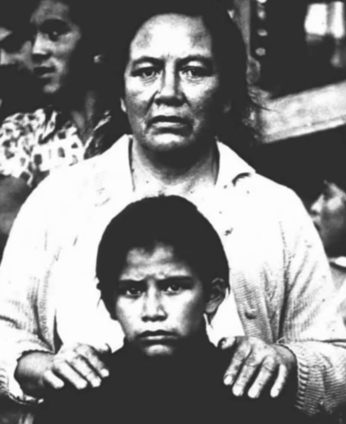 Black and white photo of a worried woman and child, relating to the monster who strangled over 100 young girls case. Black and white photo of a worried woman and child, relating to the monster who strangled over 100 young girls case.