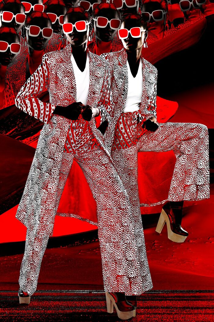 Four models wearing bright green and red high-fashion outfits in an artistic photo from the 2025 photographer award-winning contest.