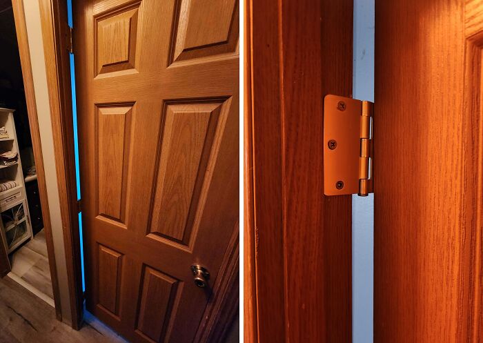 Partially open wooden door incorrectly installed showing a wide gap, illustrating people allergic to acting like sensible adults.