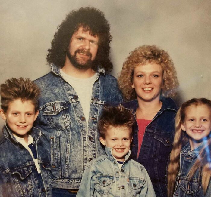 Family photo from the 80s with matching denim jackets and retro hairstyles, a classic example of funny family photos.