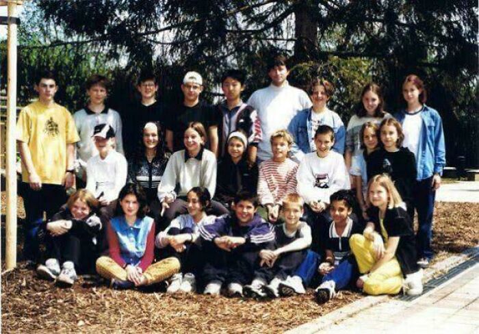 Group photo of diverse young people outdoors, illustrating fascinating photos and stories that may help you see the world differently.