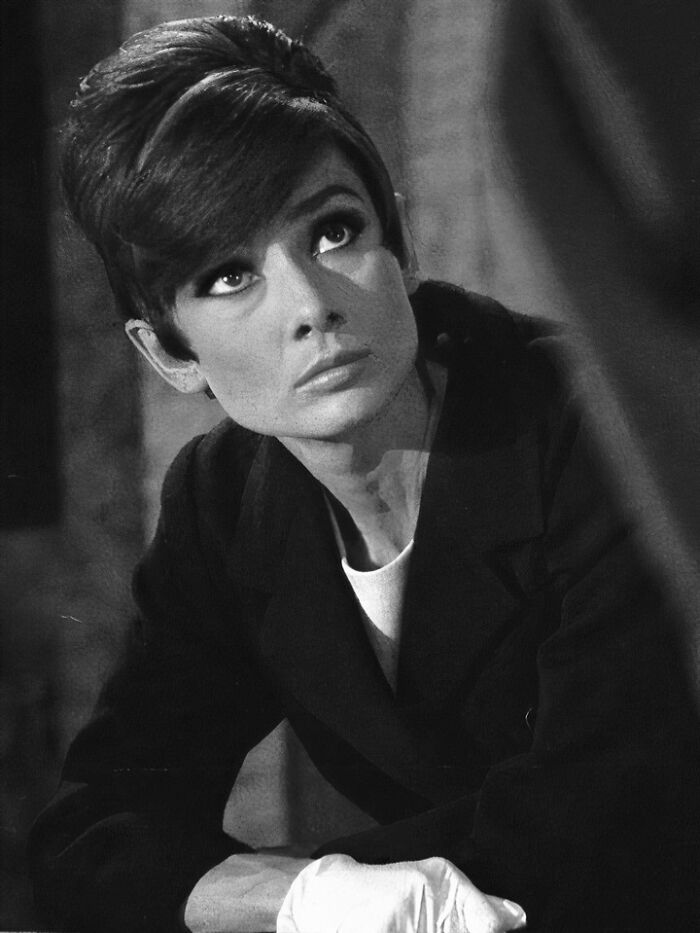 Black and white portrait of a woman with vintage hairstyle, representing iconic figures who left a mark in movie and music industries. Black and white portrait of a woman with vintage hairstyle, representing iconic figures who left a mark in movie and music industries.