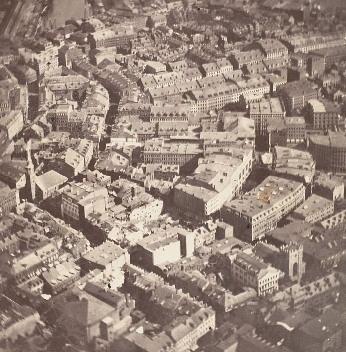 Aerial view of an old city captured in one of the earliest photos that survived from the time photography was new.