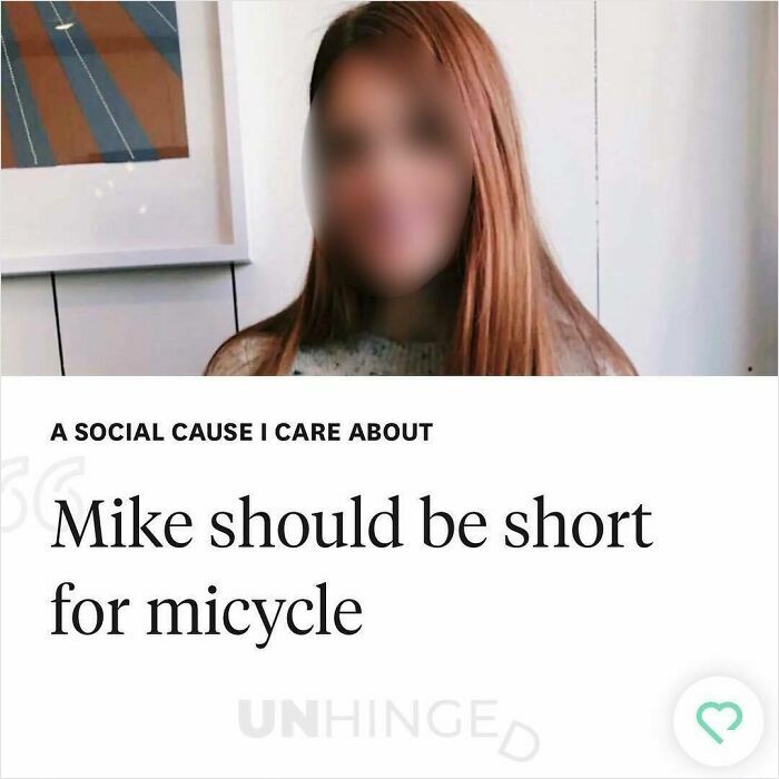 Person with long red hair blurred in an indoor setting with a humorous dating app profile text about Mike and micycle.