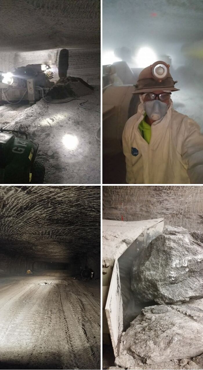 Underground mining work with heavy machinery, dusty conditions, and a masked worker in a hazardous environment.
