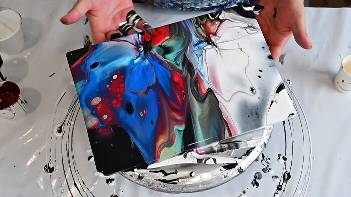 Hidden Treasure Beneath Black: Mesmerizing Faux Pillow Fluid Art