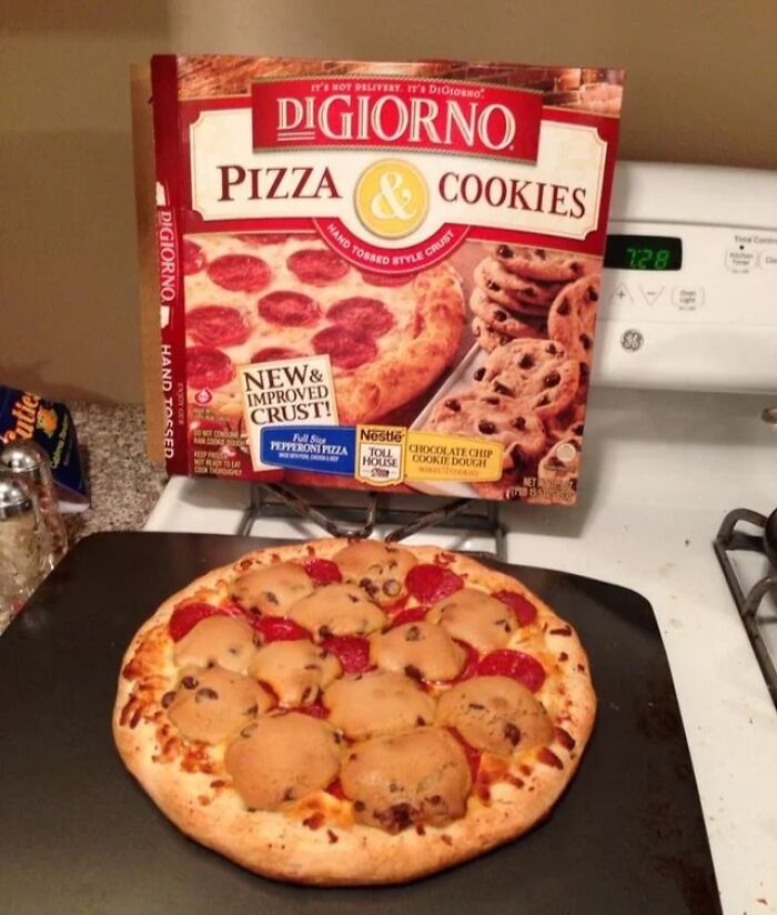 DiGiorno pizza with baked chocolate chip cookies on top, a cursed and disgusting picture of food on a stove.