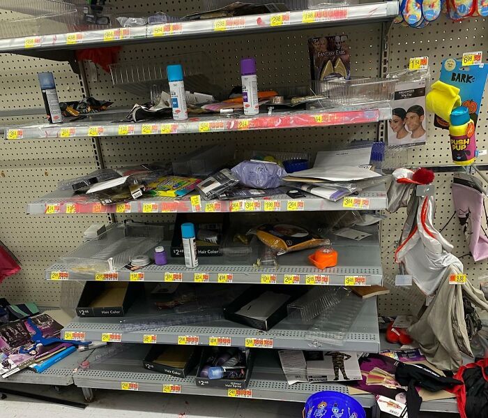 Store shelves with messy and scattered Halloween costume supplies showing Halloween fails in preparation for the holiday season.