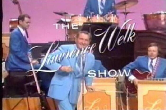 The Lawrence Welk Show band performing in vintage attire, a nostalgic image making people feel very old.