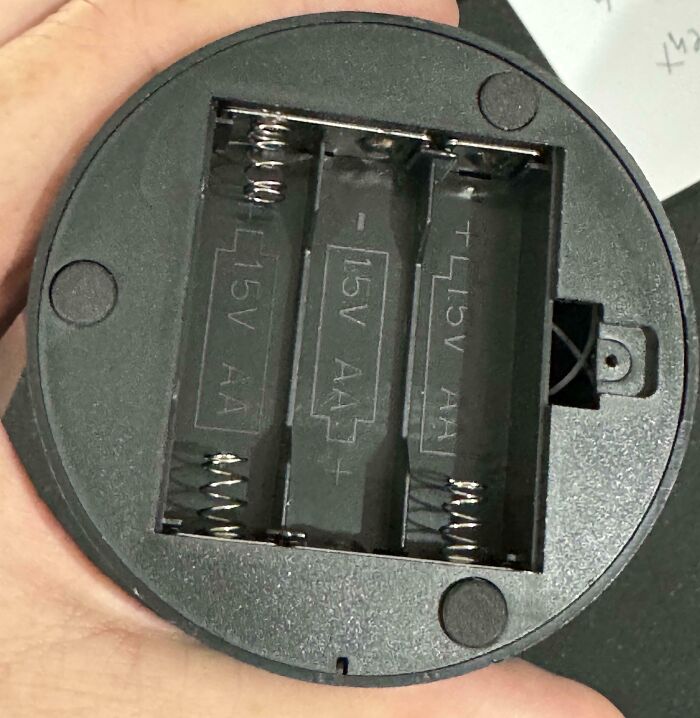 Empty battery compartment missing batteries, a common Halloween fail that can ruin the spooky atmosphere.