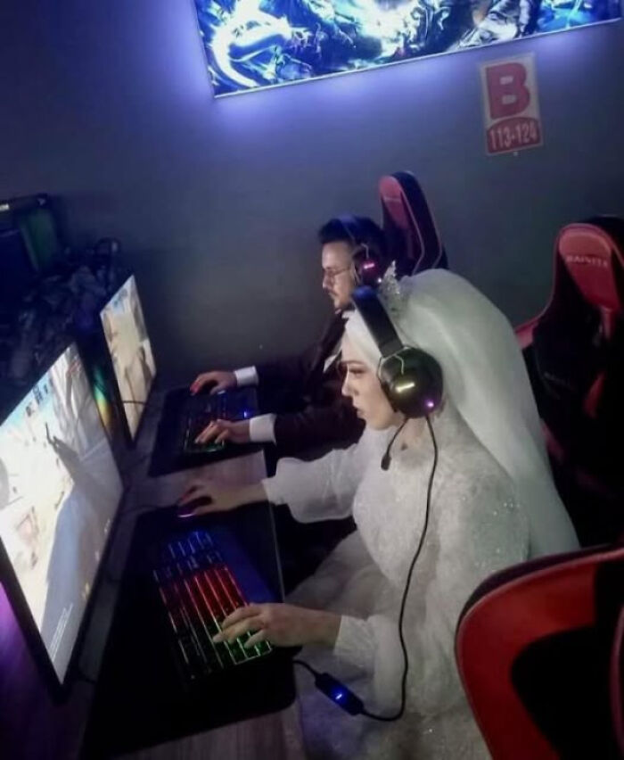 Bride and groom gaming together in a colorful esports setup, capturing people chuckling at pictures that go hard.