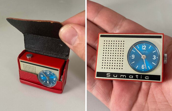 Vintage Sumatic clock radio held in hand, a unique thrift store jackpot find by lucky shoppers.