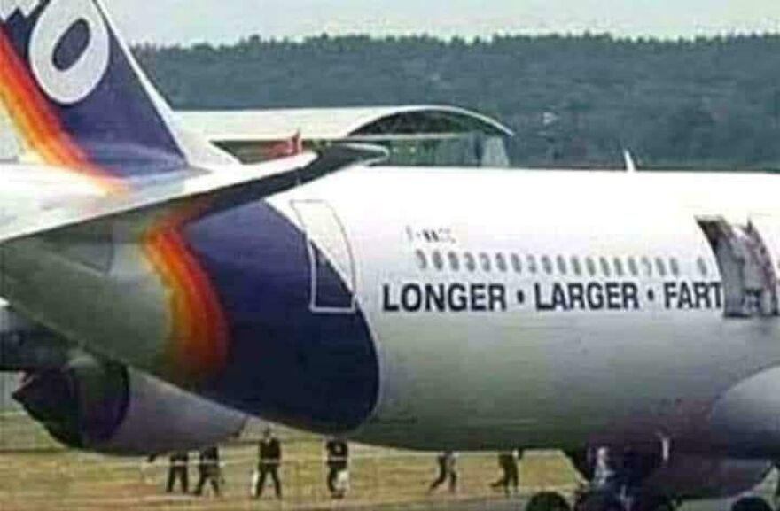 Airplane with altered logo reading longer larger fart, showing people knew exactly what they were doing and still went for it.