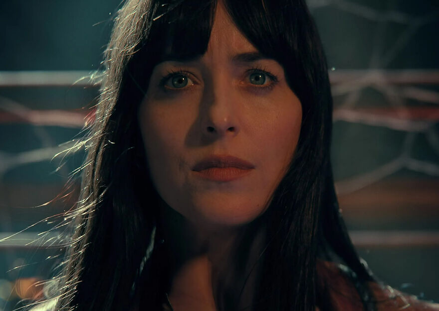 Close-up of a woman with dark hair showing a shocked expression representing 2024 pop culture moments.