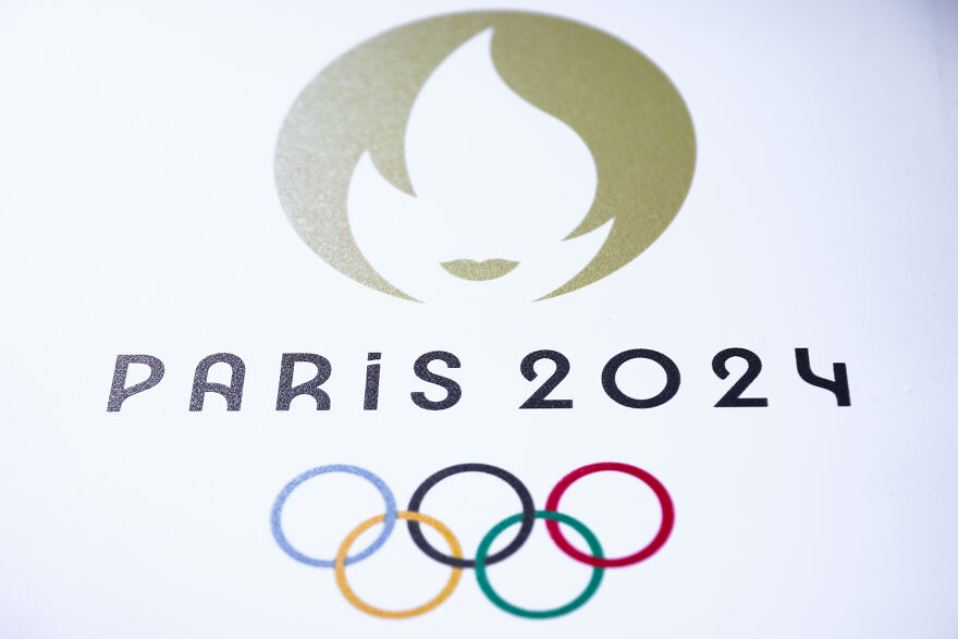 Paris 2024 Olympics logo with Olympic rings, representing one of the most shocking pop culture moments of 2024.