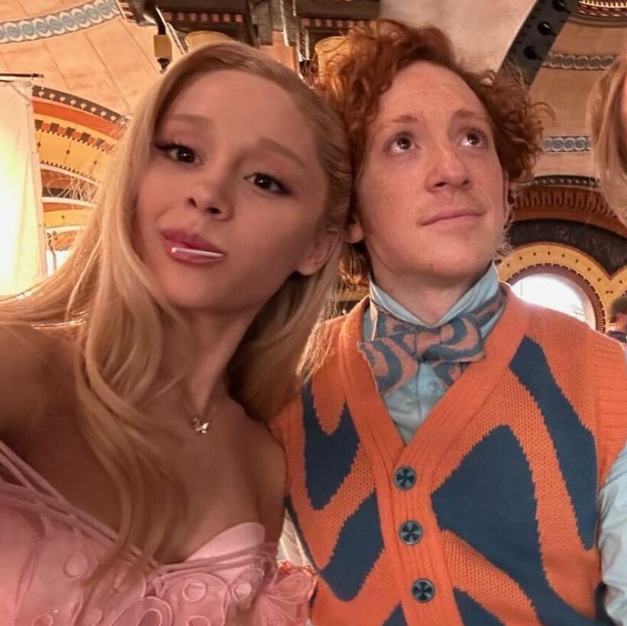 Ariana Grande and Ethan Slater posing indoors, capturing one of 2024 pop culture moments that totally shocked fans.