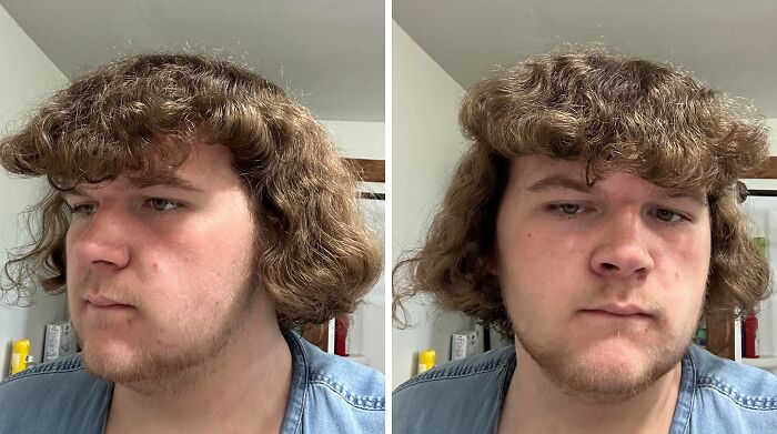Young man with tragically uneven, curly hair showcasing a hilarious hair accident in a casual indoor setting.