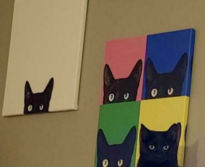 Black cats blending with colorful paintings, showcasing purrfectly camouflaged cats that are not easy to spot.