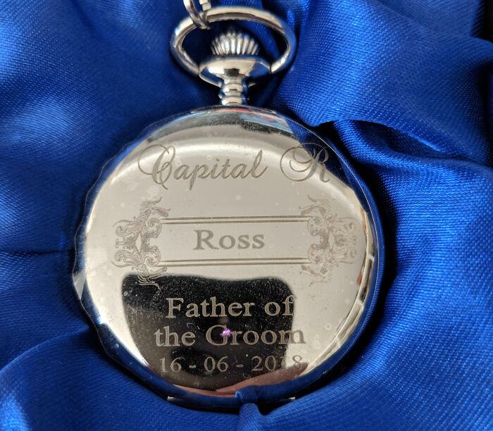 Engraved pocket watch for the father of the groom, reflecting unhinged pics of people doing exactly what they were asked to do.