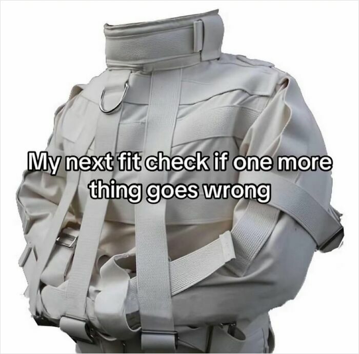 Person wearing a white straightjacket with text about a fit check going wrong, related to 3AM unhinged memes.