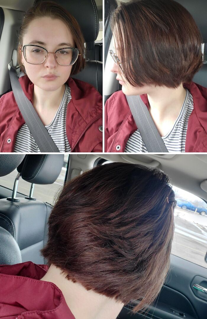 Woman with short hair wearing glasses and a red jacket showing a tragic hair accident hairstyle inside a car.