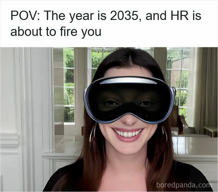 Woman smiling and wearing futuristic VR goggles with text about HR firing you, related to getting laid off memes.