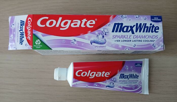 Colgate MaxWhite toothpaste packaging showing sparkle diamonds and cooling effect, example of misleading product packaging.